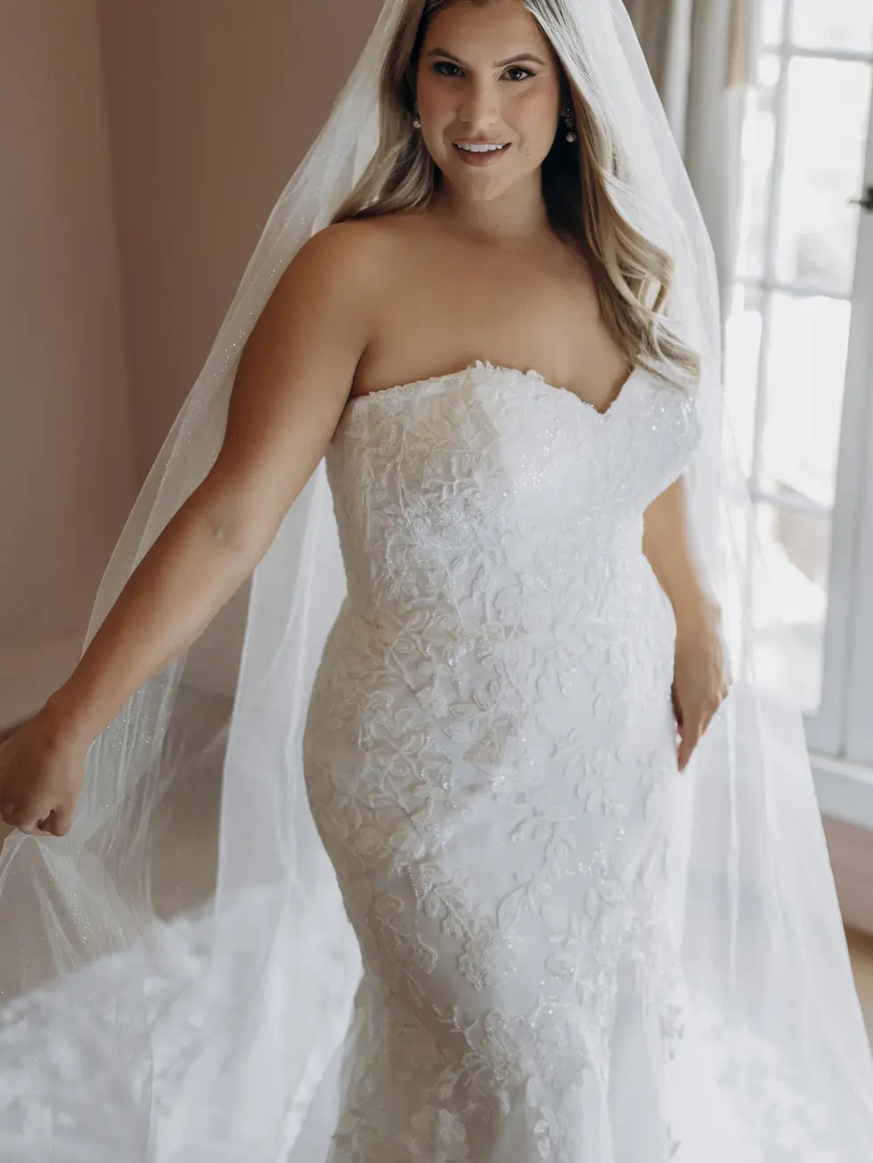Stella York SY8332 trumpet wedding dress at Wedding Belles Love Staffordshire featuring romantic floral lace
