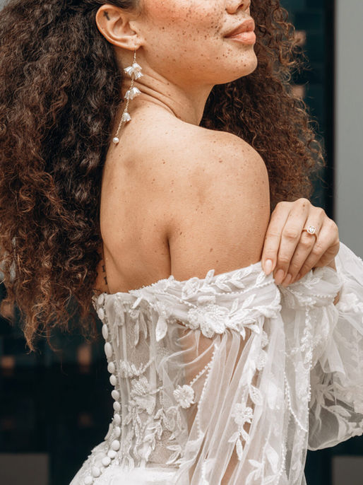 Trendy Stella York wedding dresses featuring modern silhouettes, romantic lace details, luxurious fabrics, and effortlessly stylish bridal designs for the fashion forward bride. Wedding Belles Love