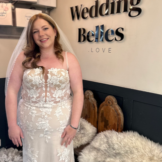 A close up of delicate bridal lace showing intricate detail and texture.