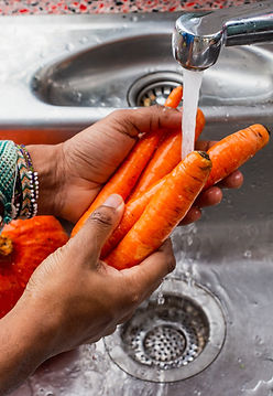 person washing carrots_edited.jpg
