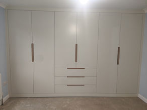 Elevate Your Space with New Oak Interior Inlay Handles for Modern White Wardrobes