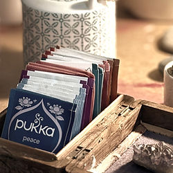 Pukka teas in an old wooden box