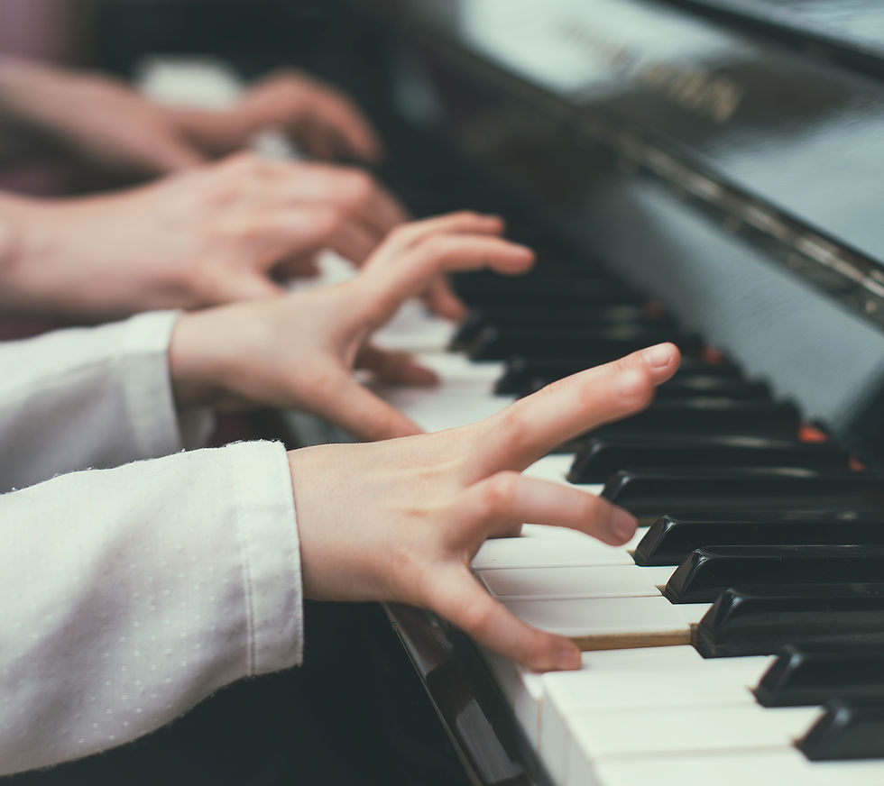 Student playing piano during a 30-minute private music lesson
