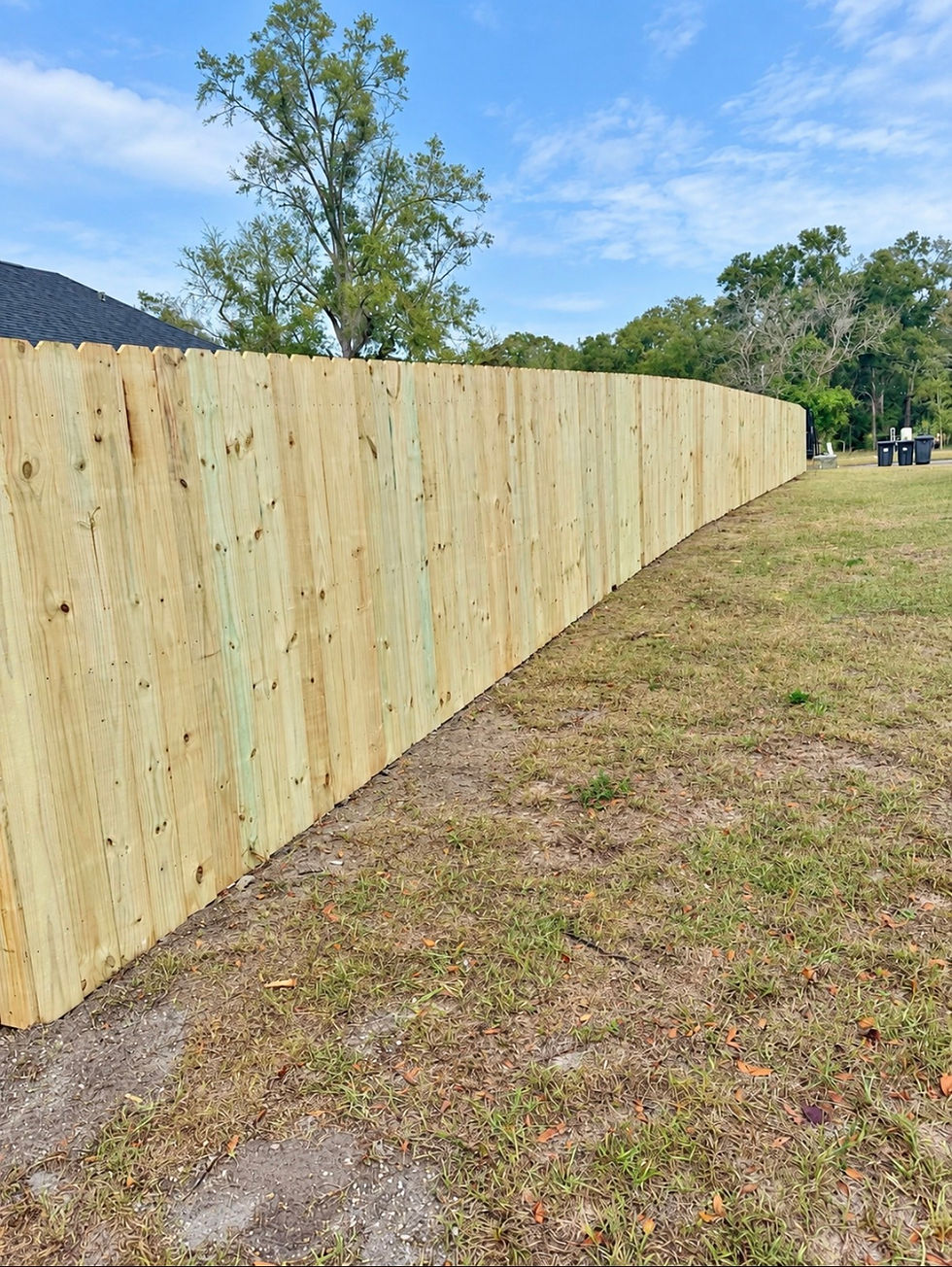 Wood fence install on residential property in Gainesville