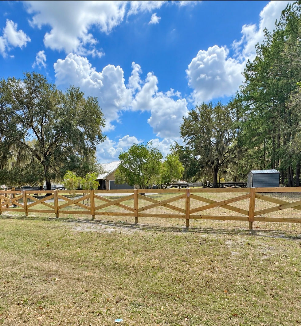 Wood crossbuck farm fence on a rural North Florida Property