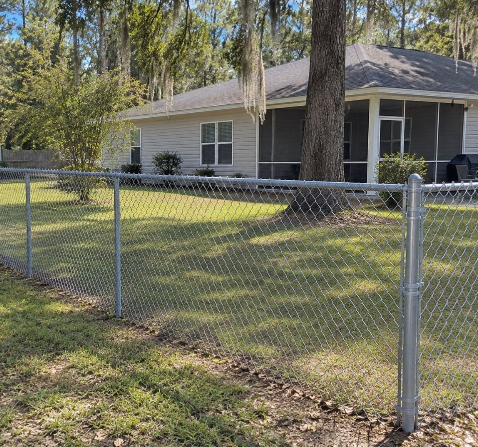 galvanized chain link FENCE installed around a residential property