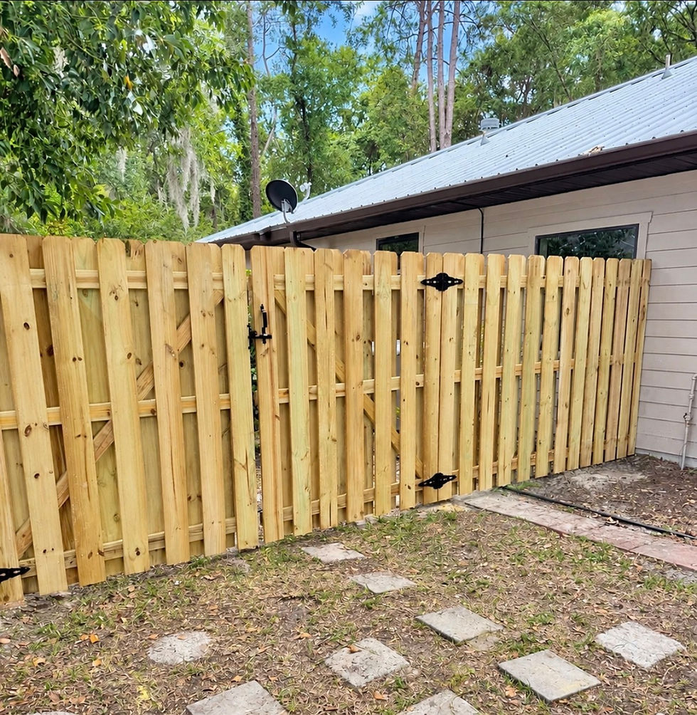 Shadow box wood fence and gate installation in Alachua Florida