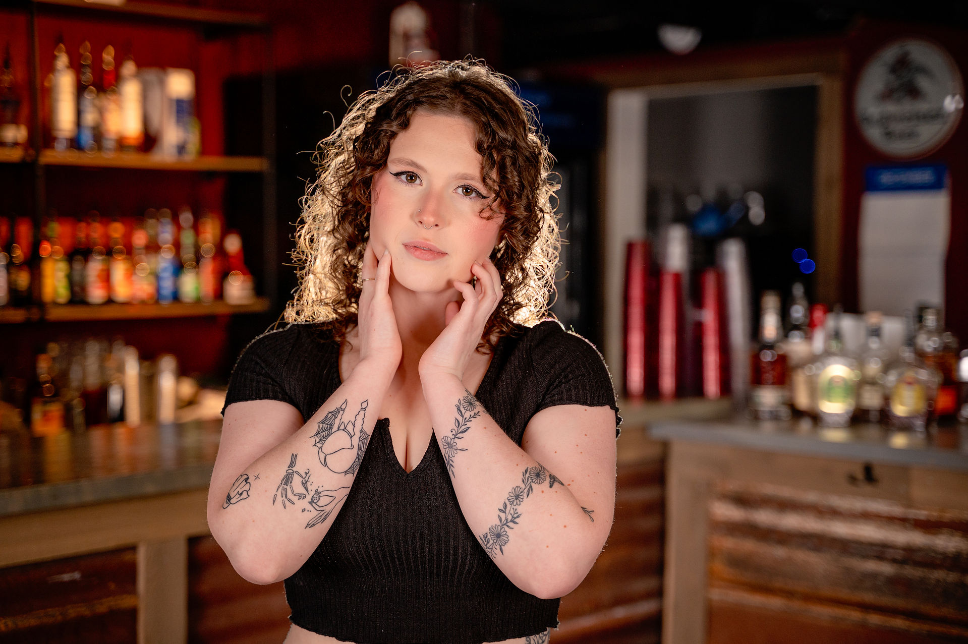 Tattoo model showcasing intricate sleeve design in Winlock, WA