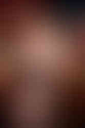 Tattoo model showcasing intricate sleeve design in Winlock, WA