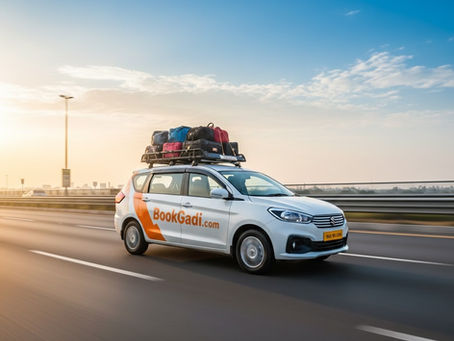 White Ertiga taxi with BookGadi.com branding on Yamuna Expressway, providing comfortable long-distance travel from Azamgarh to Delhi and Noida.