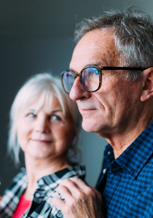 elderly-couple-retirement-home-window
