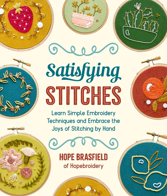 Book cover with various hoops on the cover and a title that reads, "Satisfying Stitches: Learn Simple Embroidery Techniques and Embrace the Joys of Stitching by Hand"
