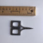 Thumbnail: Pair of silver embroidery scissors with rectangular handles and a lace design next to a ruler.