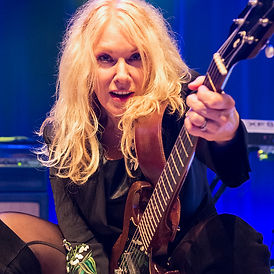Nancy-Wilson-squat-shot-by-ALLAN-ZILKOWS