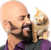 Jackson Galaxy Smiliing at Kitten on Shoulder