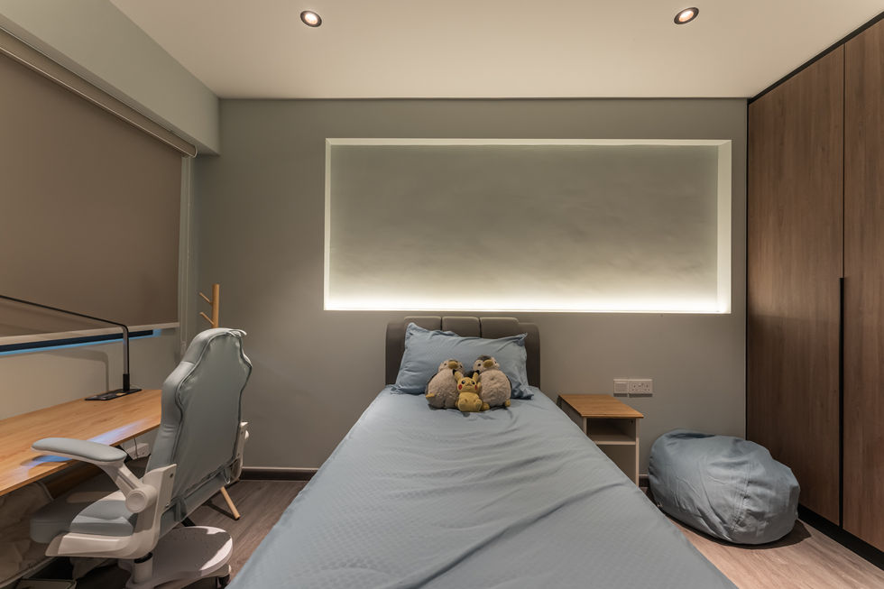 A dual-seat workstation extends functionality, perfect for work or study. Simple, integrated lighting and a soft neutral palette give the space a relaxed and refined feel.