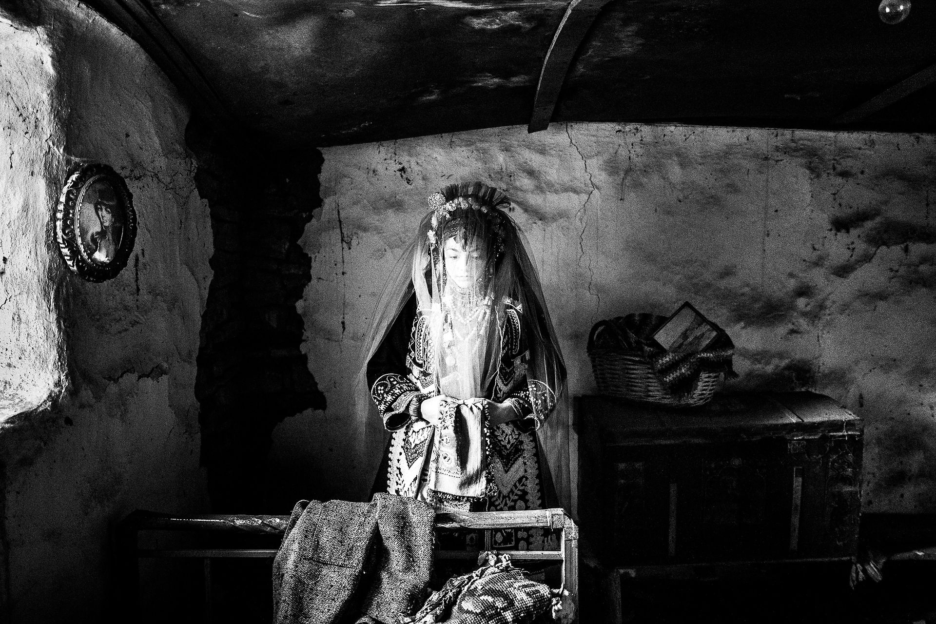 The bride inside a local house at Issaakion village, Evros, Thrace, Greece, by photographer George Tatakis