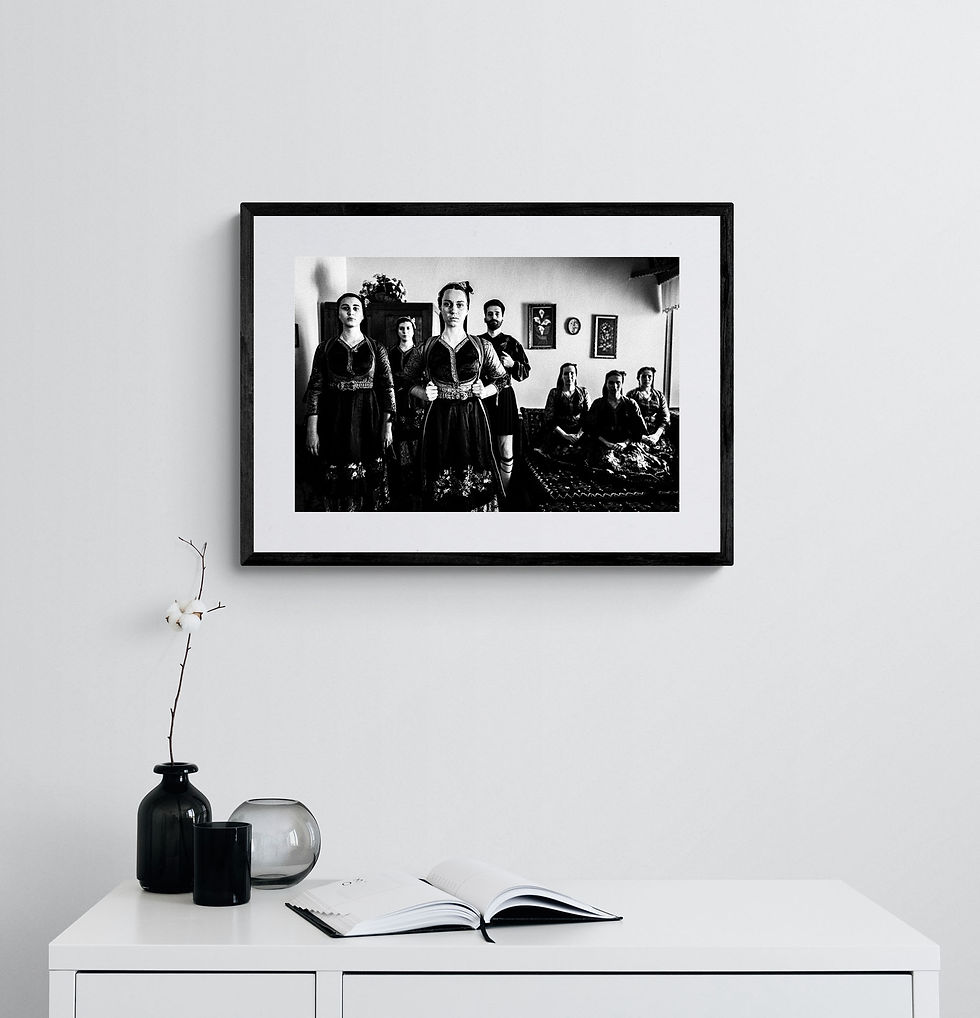 Thumbnail: Metsovo Costumes print framed on white wall. Black-and-white photography by George Tatakis.