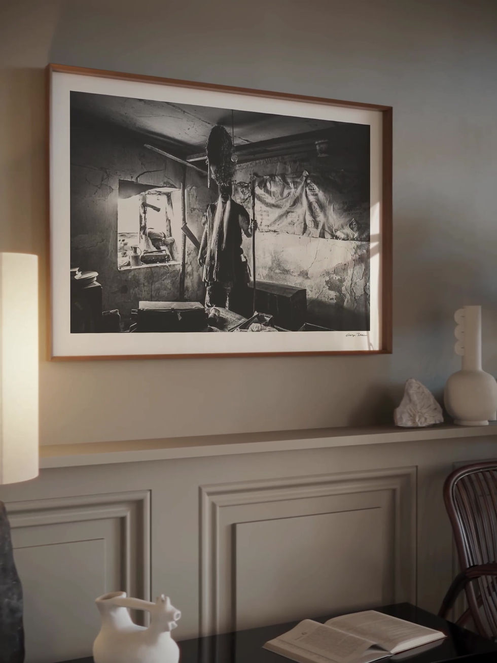 Thumbnail: Standing Koudounoforos print framed inside a living room. Black-and-white photography by George Tatakis.