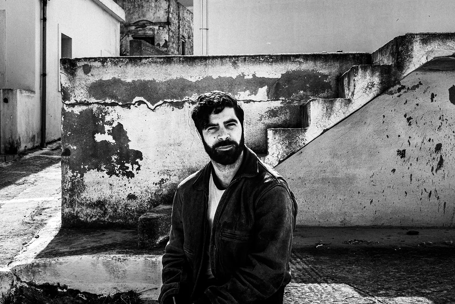 Yannis Philippakis (Foals) around Olympos in Karpathos island, Greece, by photographer George Tatakis