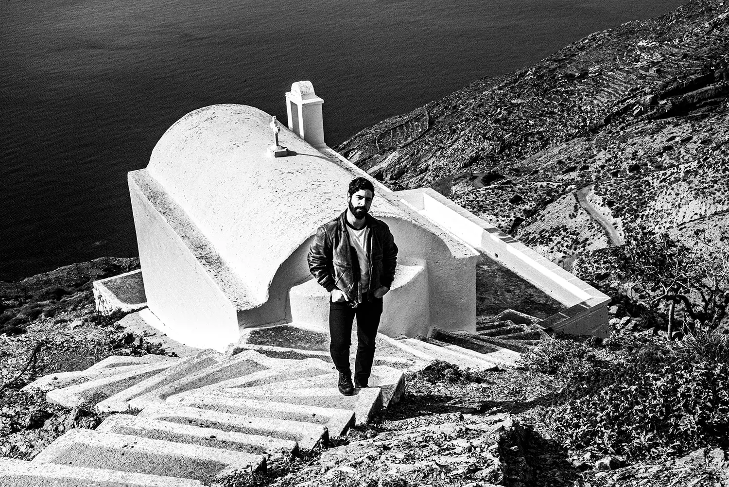 Yannis Philippakis (Foals) around Olympos in Karpathos island, Greece, by photographer George Tatakis