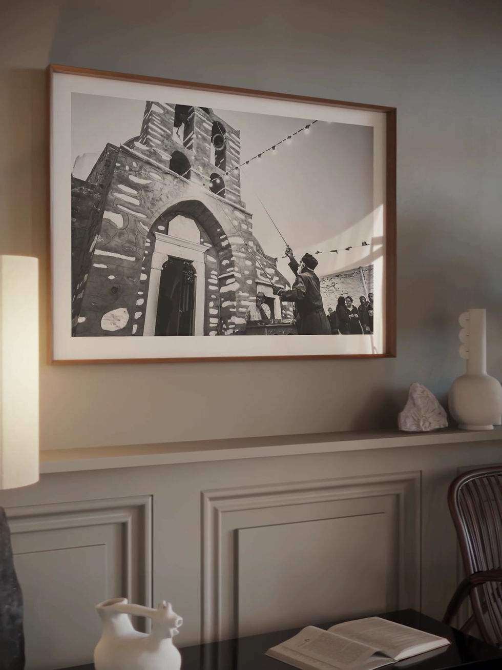 Thumbnail: Sifnos Bell print framed inside a living room. Black-and-white photography by George Tatakis.