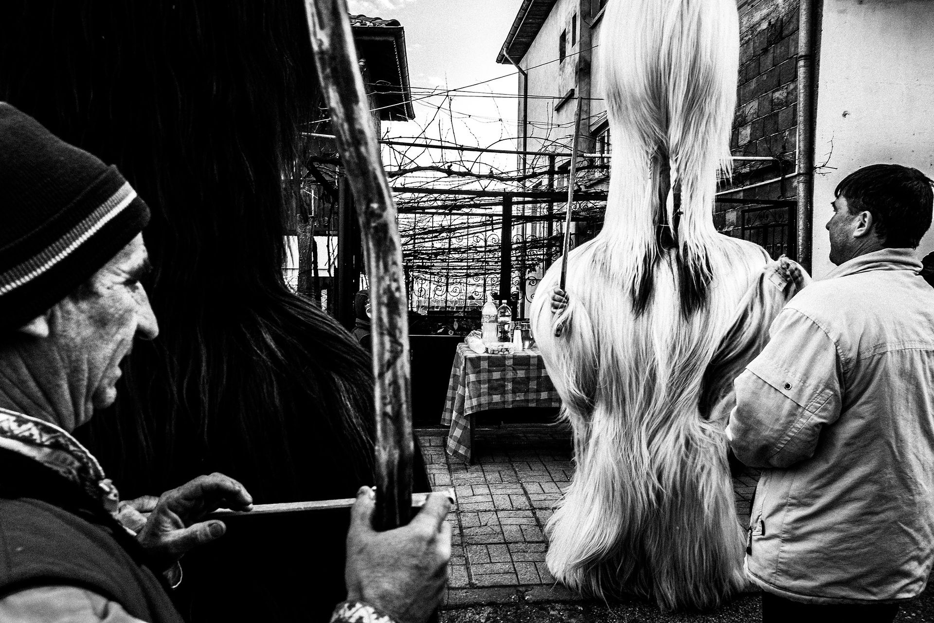 The New Year's Babuger or Kukeri Festival in Simitli, Blagoevgrad, Bulgaria, by photographer George Tatakis