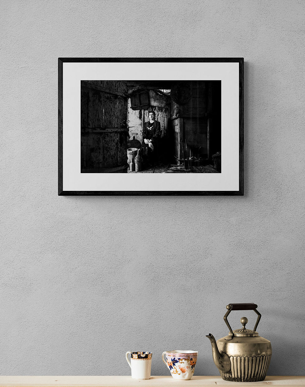 Thumbnail: Chiaroscuro Portrait print framed on a gray wall. Black-and-white photography by George Tatakis.