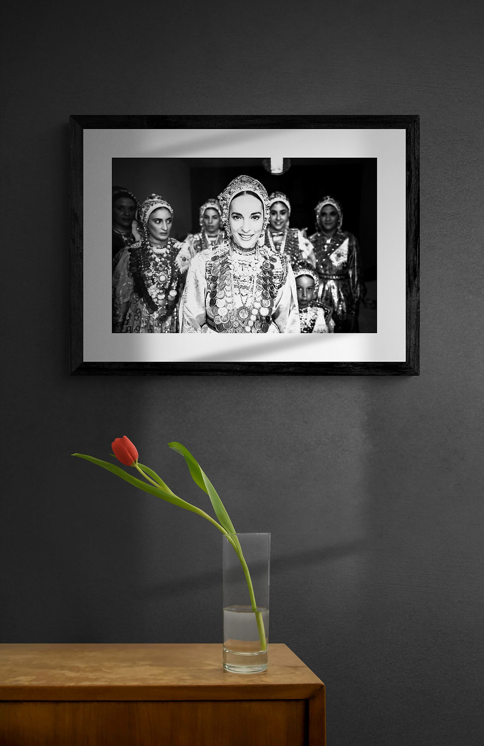 Μικρογραφία: Bride on Karpathos framed on a gray wall. Black-and-white photography by George Tatakis.