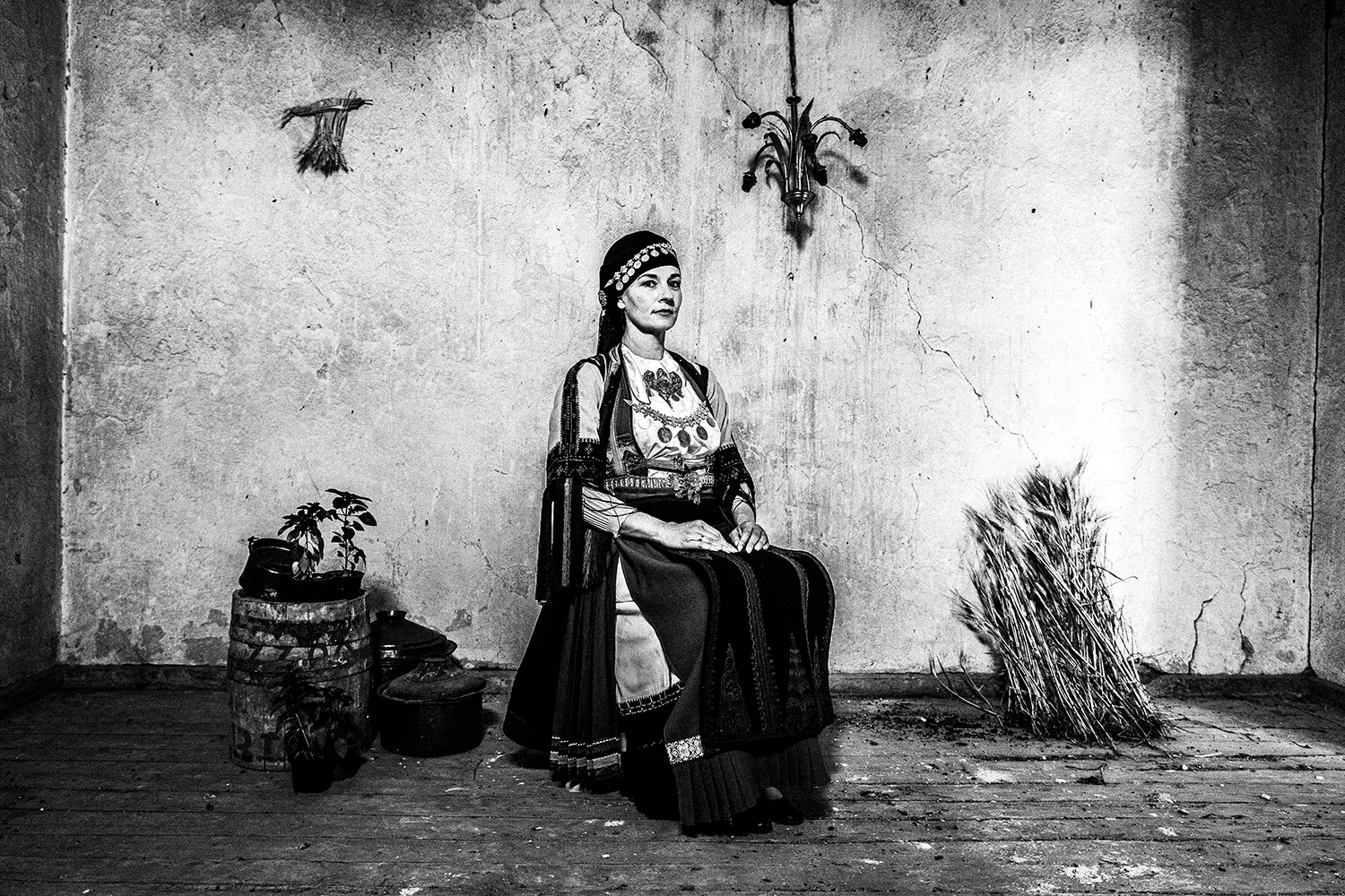 Portrait of a woman wearing the traditional Karagouna dress of Trikala, Thessaly, Greece. Black and white photography by George Tatakis