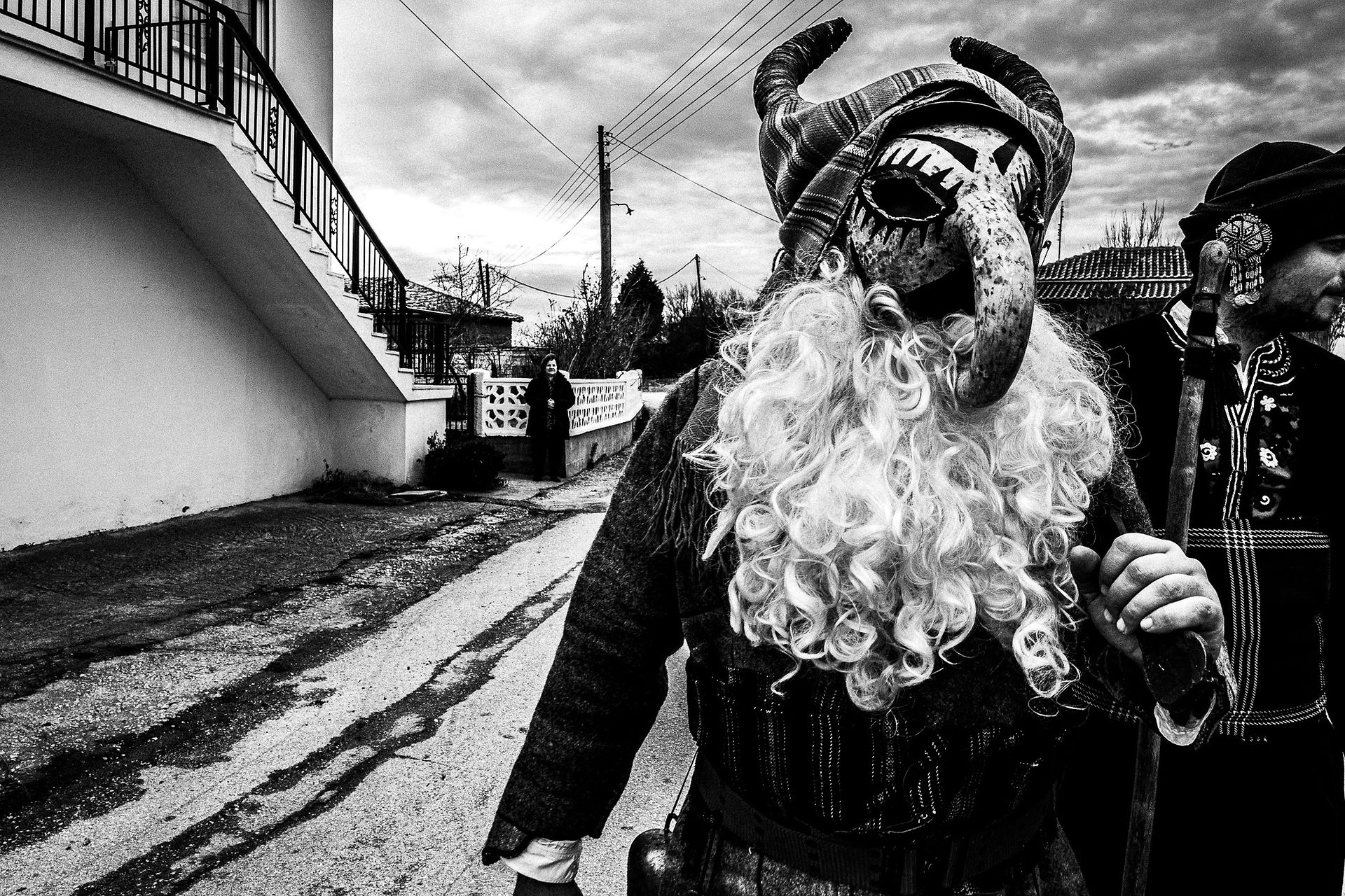 Purpuris visiting houses, Pagan Christmas customs of Northern Greece, by photographer George Tatakis