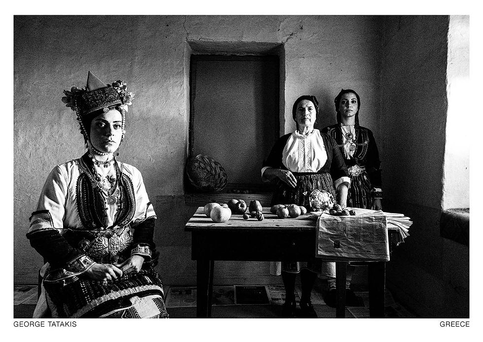 Three women posing inside an abandoned house in the village of Aggelochori, Imathia, Macedonia, Greece. Black and white photography postcard by George Tatakis, project Caryatis.