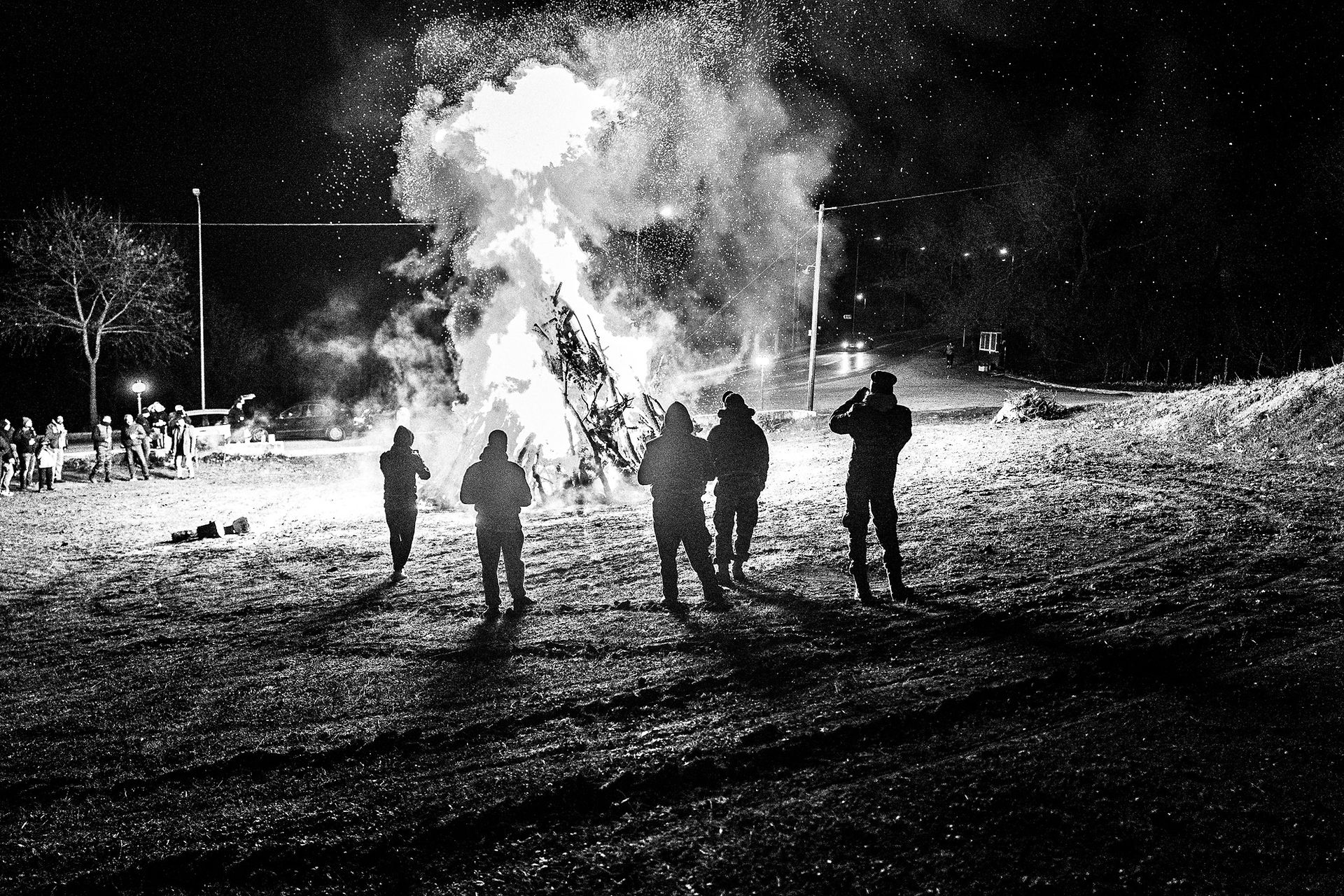 Enjoying the bonfire, Pagan Christmas customs of Northern Greece, by photographer George Tatakis