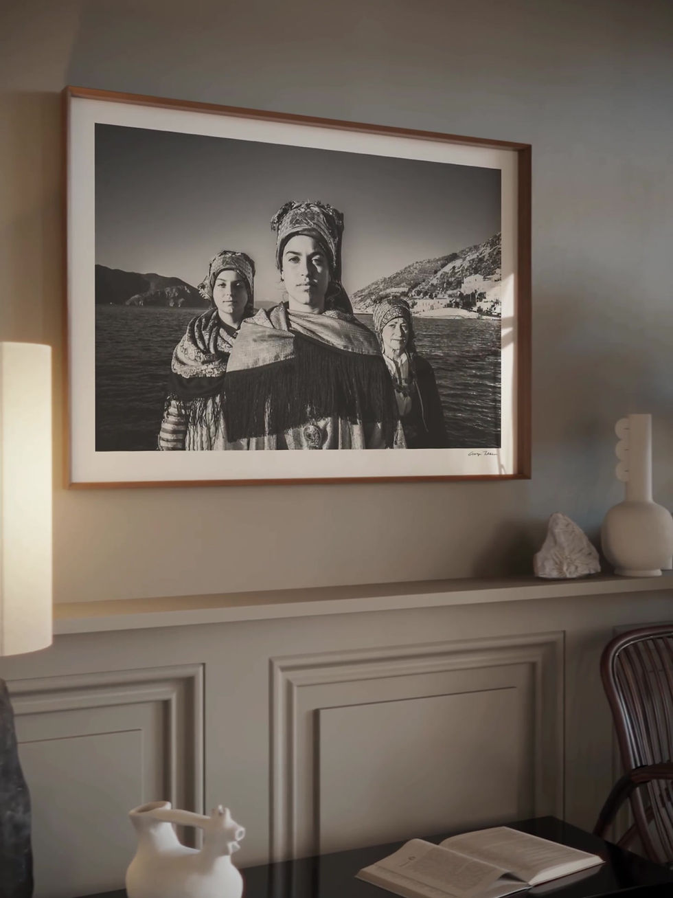 Thumbnail: Island Heritage Symi print framed inside a living room. Black-and-white photography by George Tatakis.