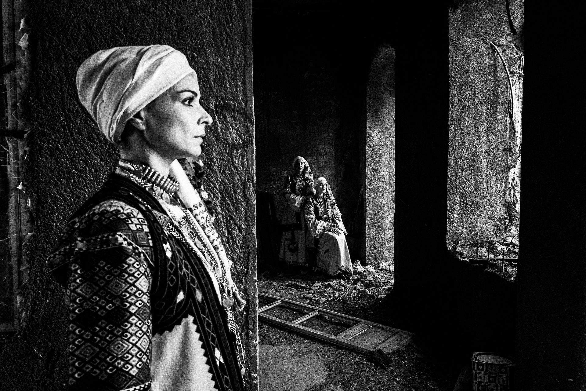Three women wearing the local costumes of Kyparissia, in Peloponnese, Greece.