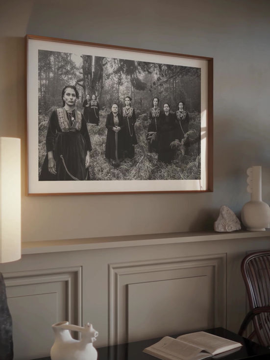 Vlachi Seli print framed inside a living room. Black-and-white photography by George Tatakis.