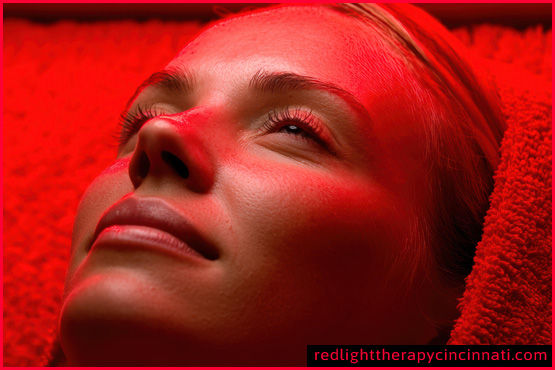 A woman utlizing safe red light therapy.