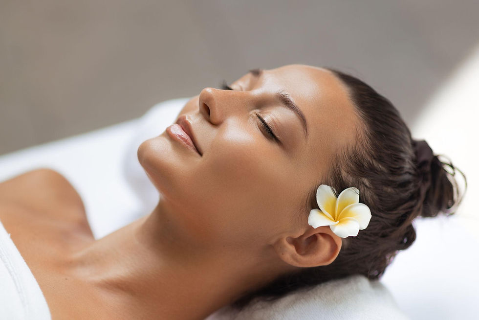 Feeling serene and rejuvenated, a woman enjoys the afterglow of cosmetic acupuncture therapy.