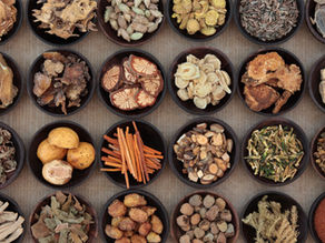 Chinese herbal medicine in a traditional herbal pharmacy used to support fertility, hormone balance, and reproductive health.
