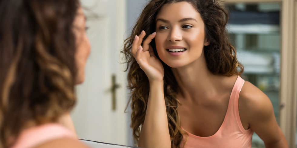 Woman in her 40s experiencing early signs of perimenopause including fatigue, brain fog, and anxiety.