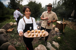 our private chef's cooking over the fire
