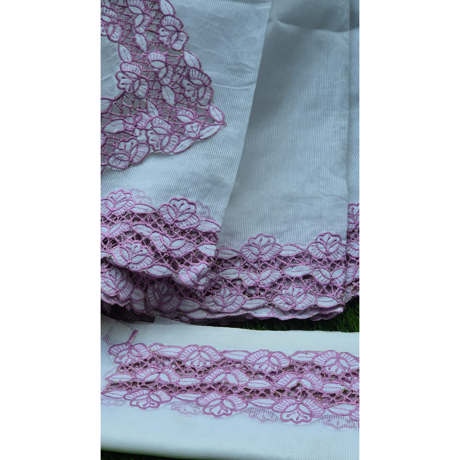 This white color cutwork saree with blouse is a perfect blend of grace and craftsmanship.