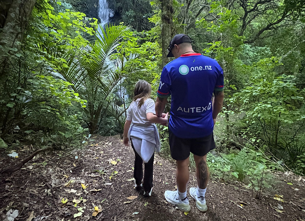 Dad in bush with daughter