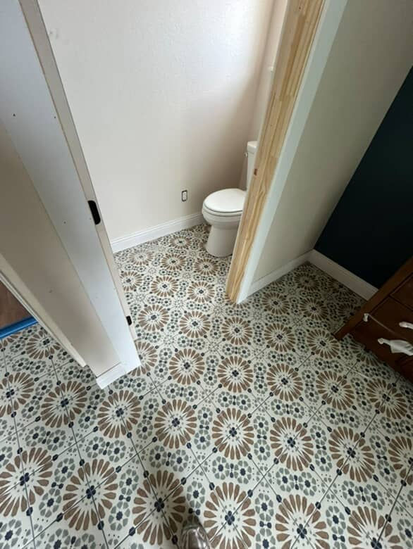 kym toilet tile floor.jpg