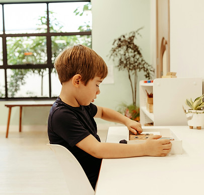 Child working in Montessori classrom
