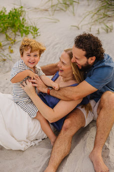 Family beach sunset photoshoot in St. Augustine Florida family of 3
