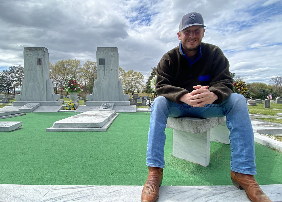 While filming in Alabama, we found the grave site of Rob's favorite country singer, Hank Williams