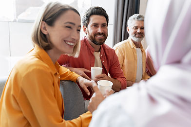 business-people-discussing-during-office-coffee-br-2026-03-26-06-05-08-utc.jpg