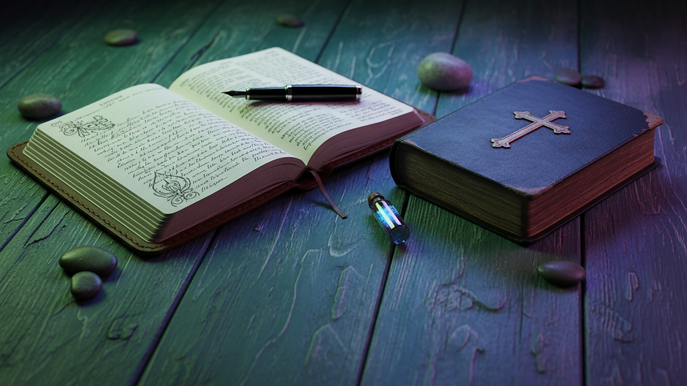Close-up view of a journal and a Bible on a wooden table