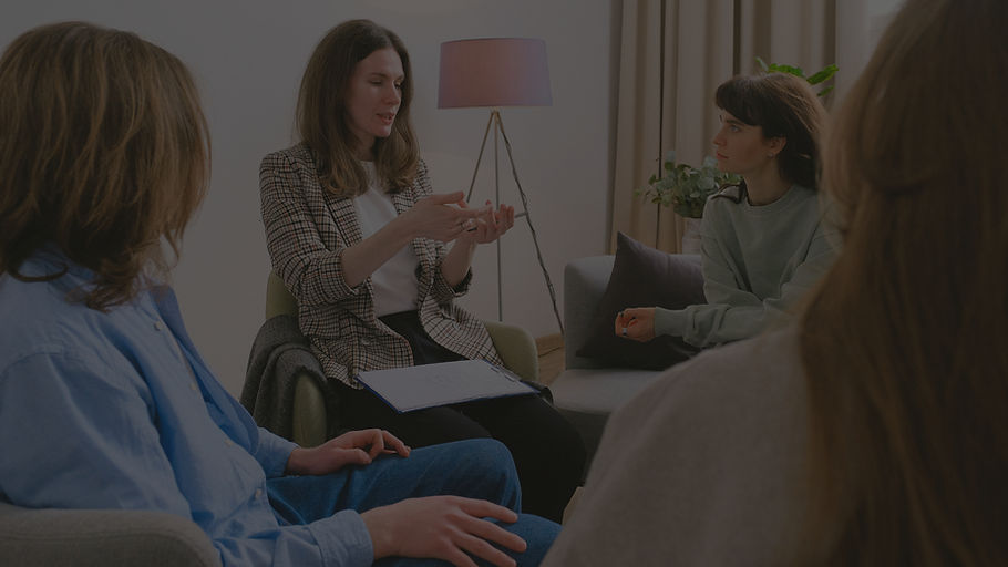 Therapist leading group therapy session